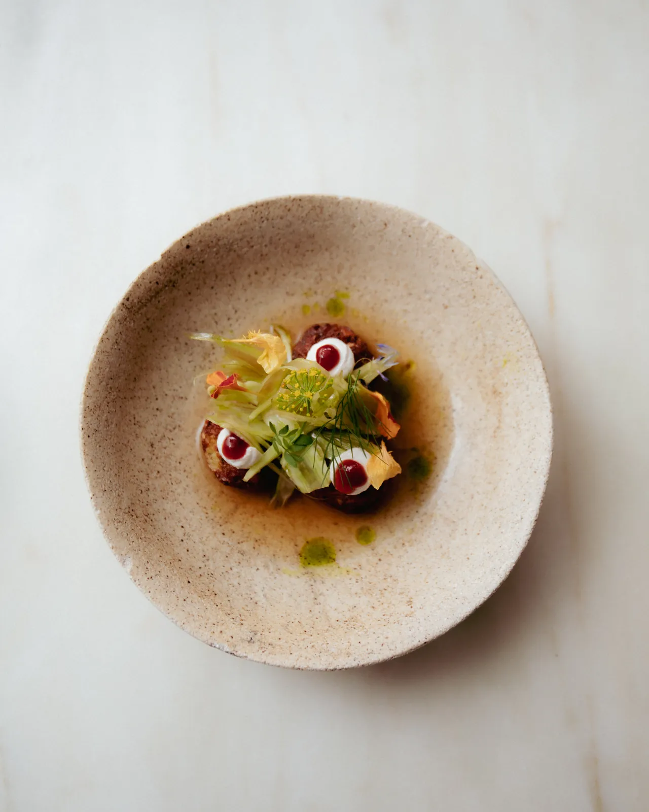 the grass pea falafel course, from above