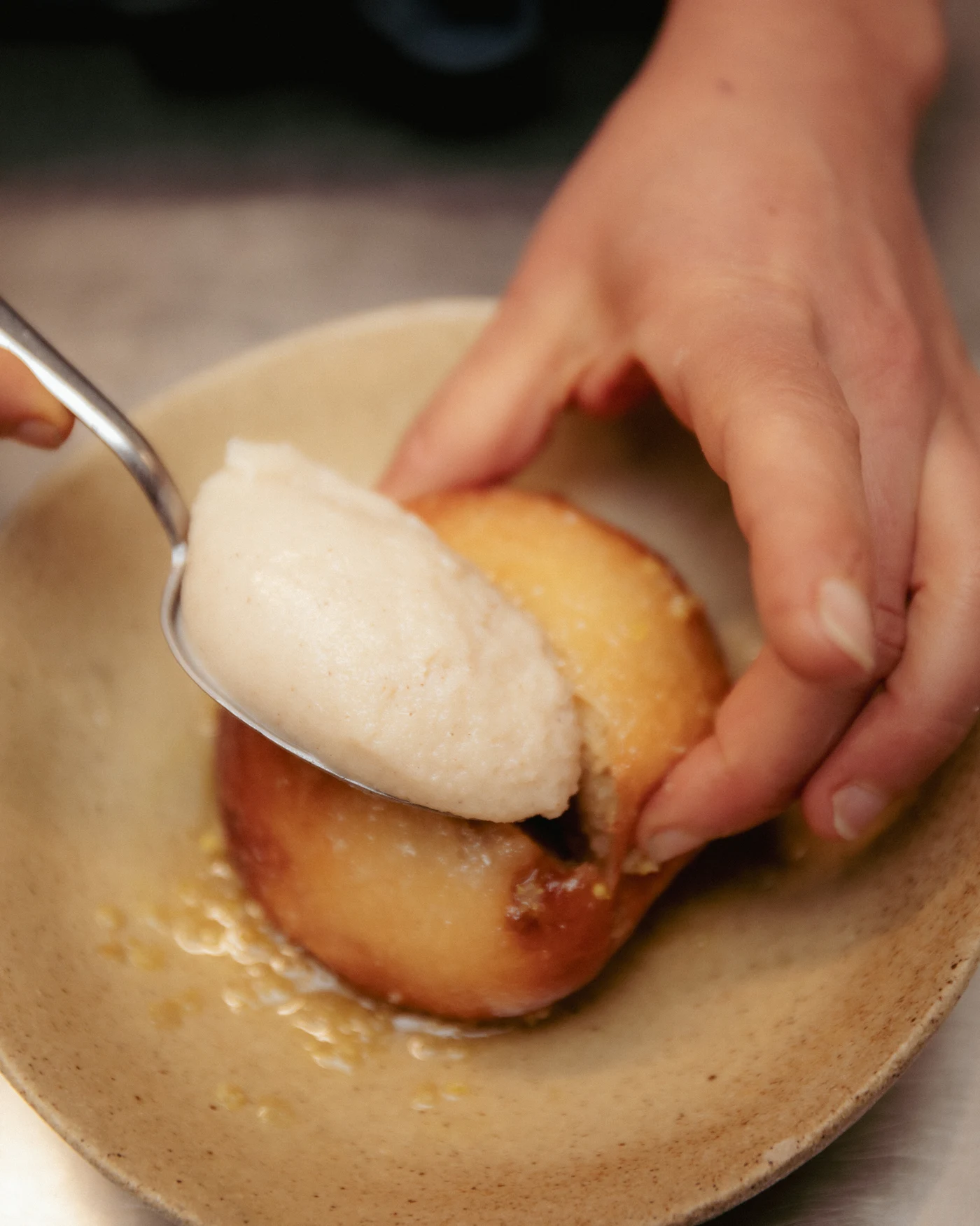 Hands finishing a plate at venn