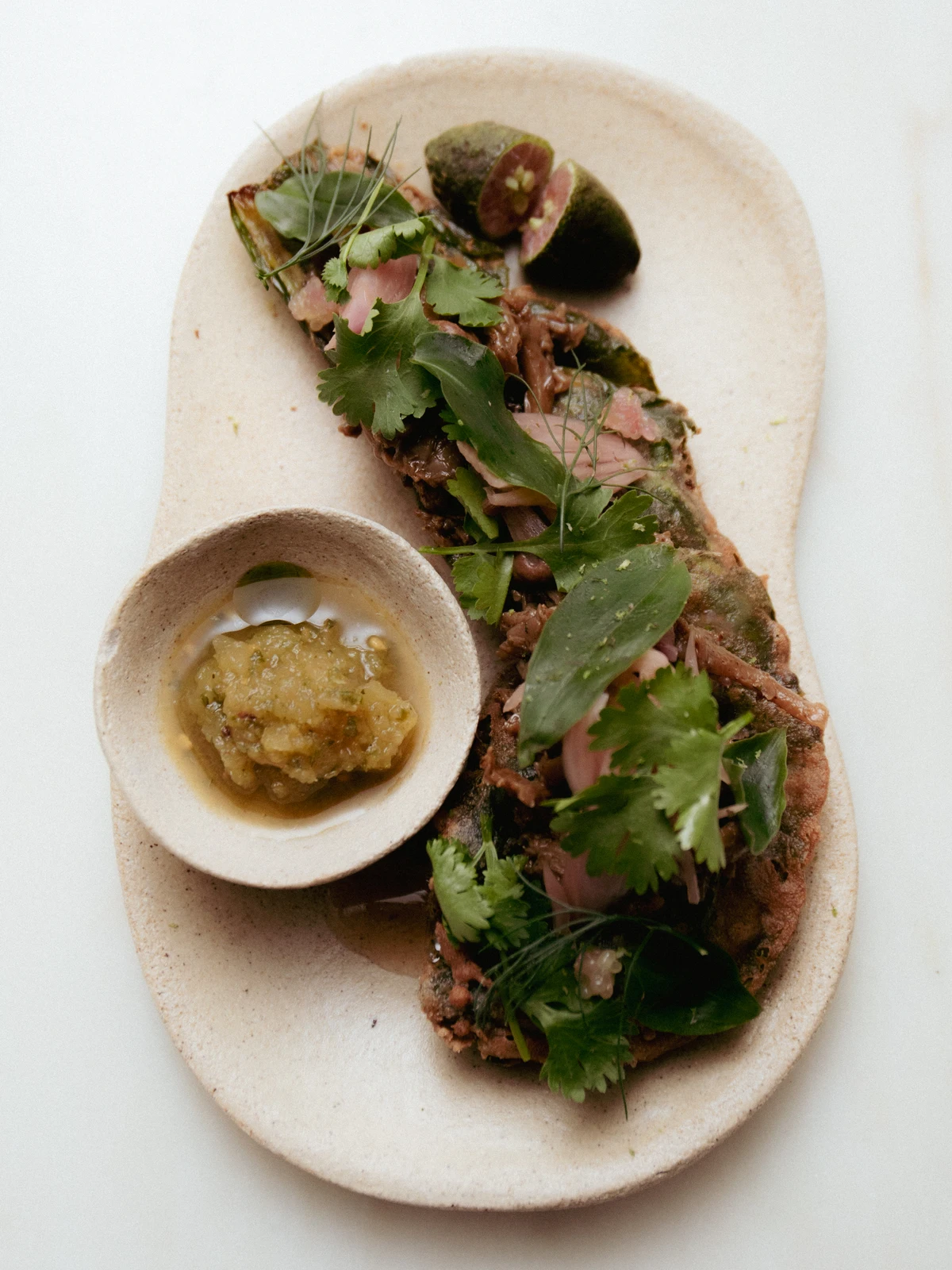 fried wild leaves · alt-'choc' mole · lime