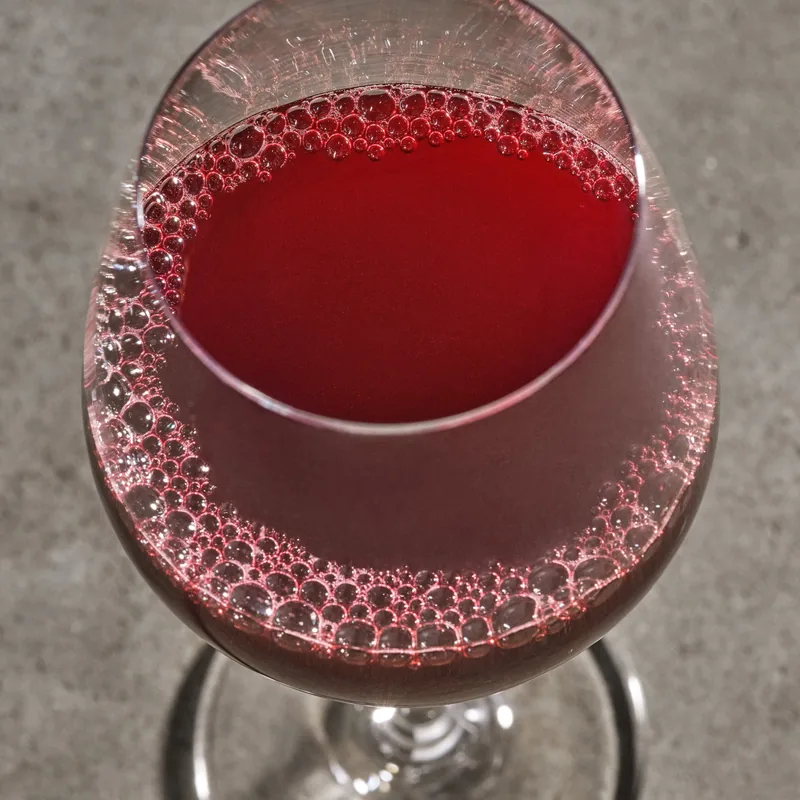 The Four Horsemen in a wine glass, deep red