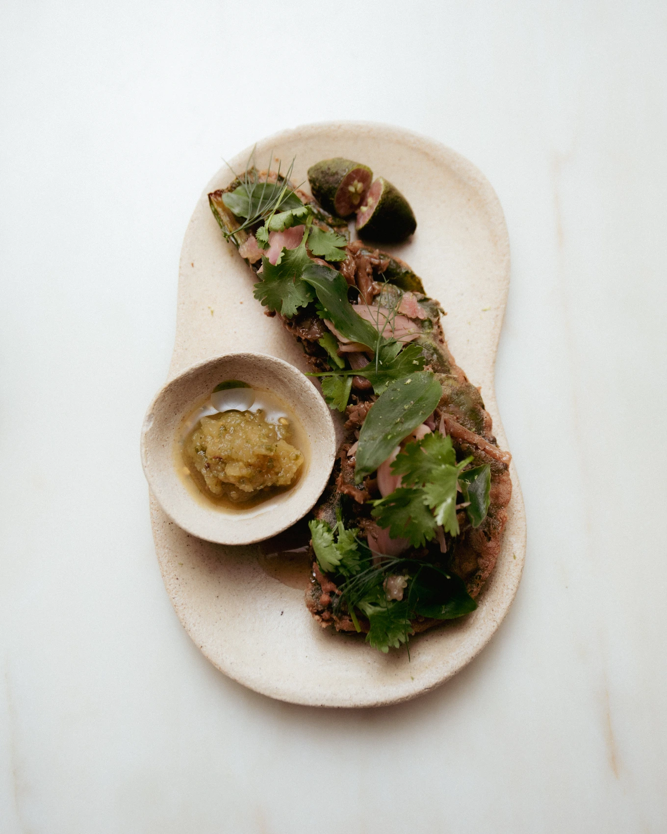 fried wild leaves 1 · plated · hero