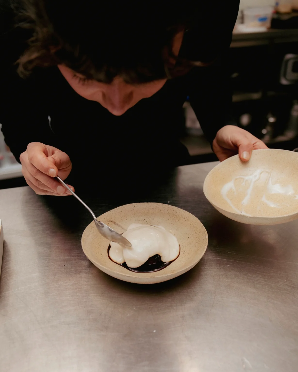 Monika plating a dish at VENN
