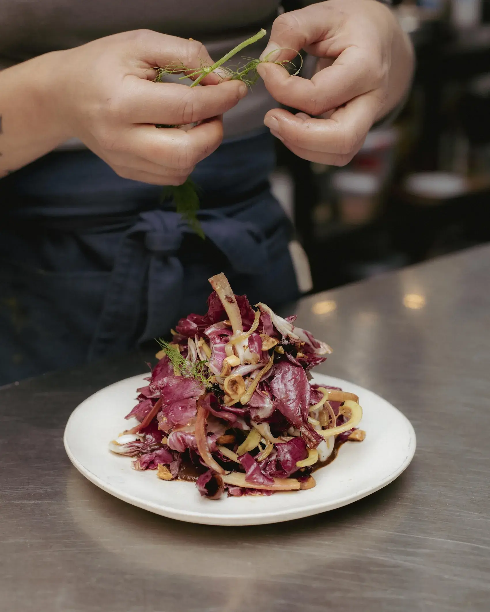 chef finishing dish