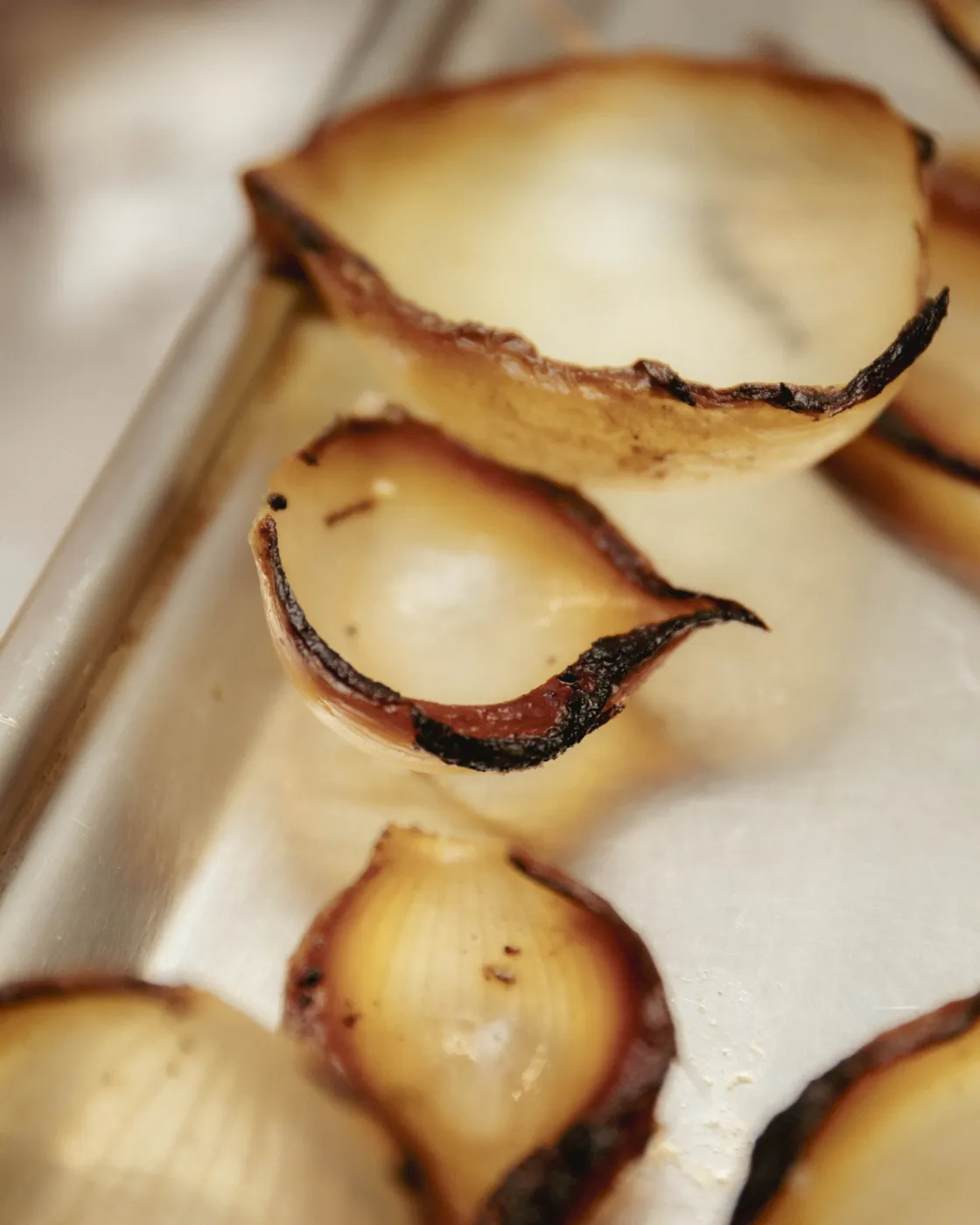 onion skins, into an ash oil