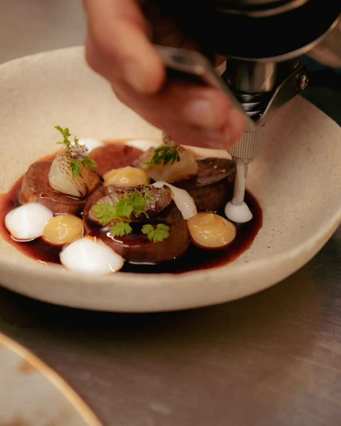 onion skins, into an ash oil